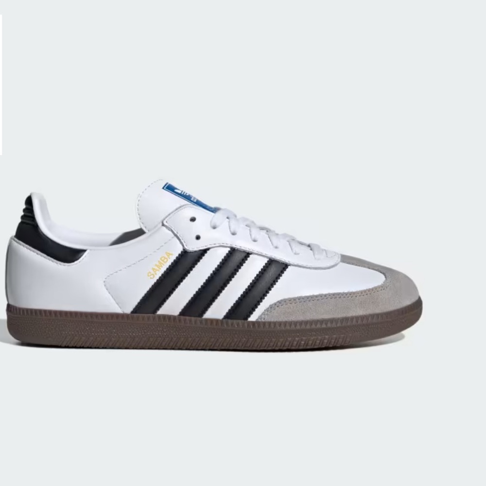 Adidas women’s White and Black Sneakers